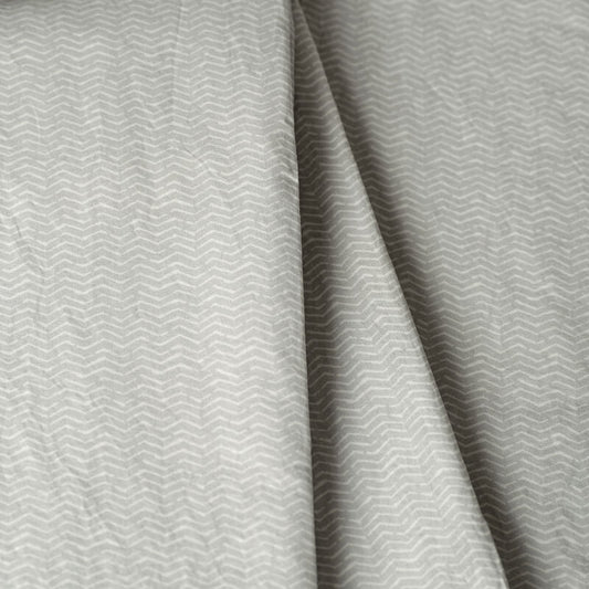 Gray fabric with a subtle pattern. 100% Organic percale cotton bed sheets. 