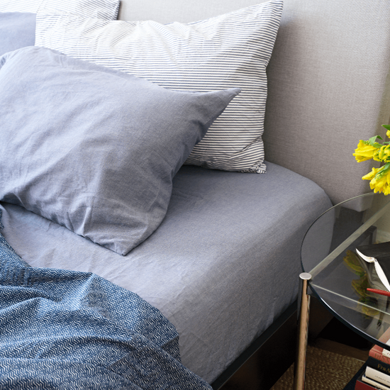 Mid century bed with blue sheets. 100% Organic percale cotton bed sheets. 