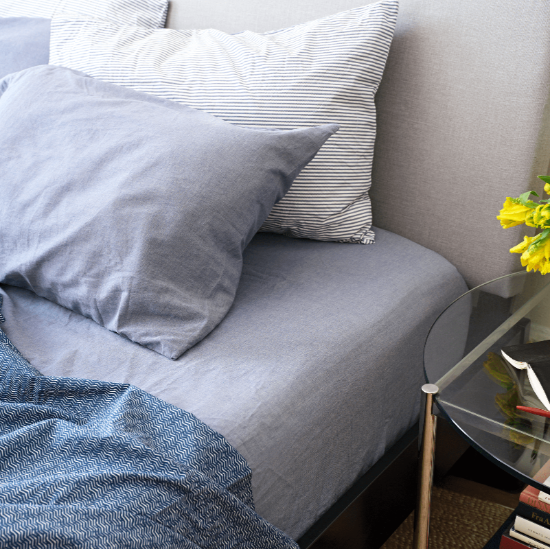 Mid century bed with blue sheets. 100% Organic percale cotton bed sheets. 